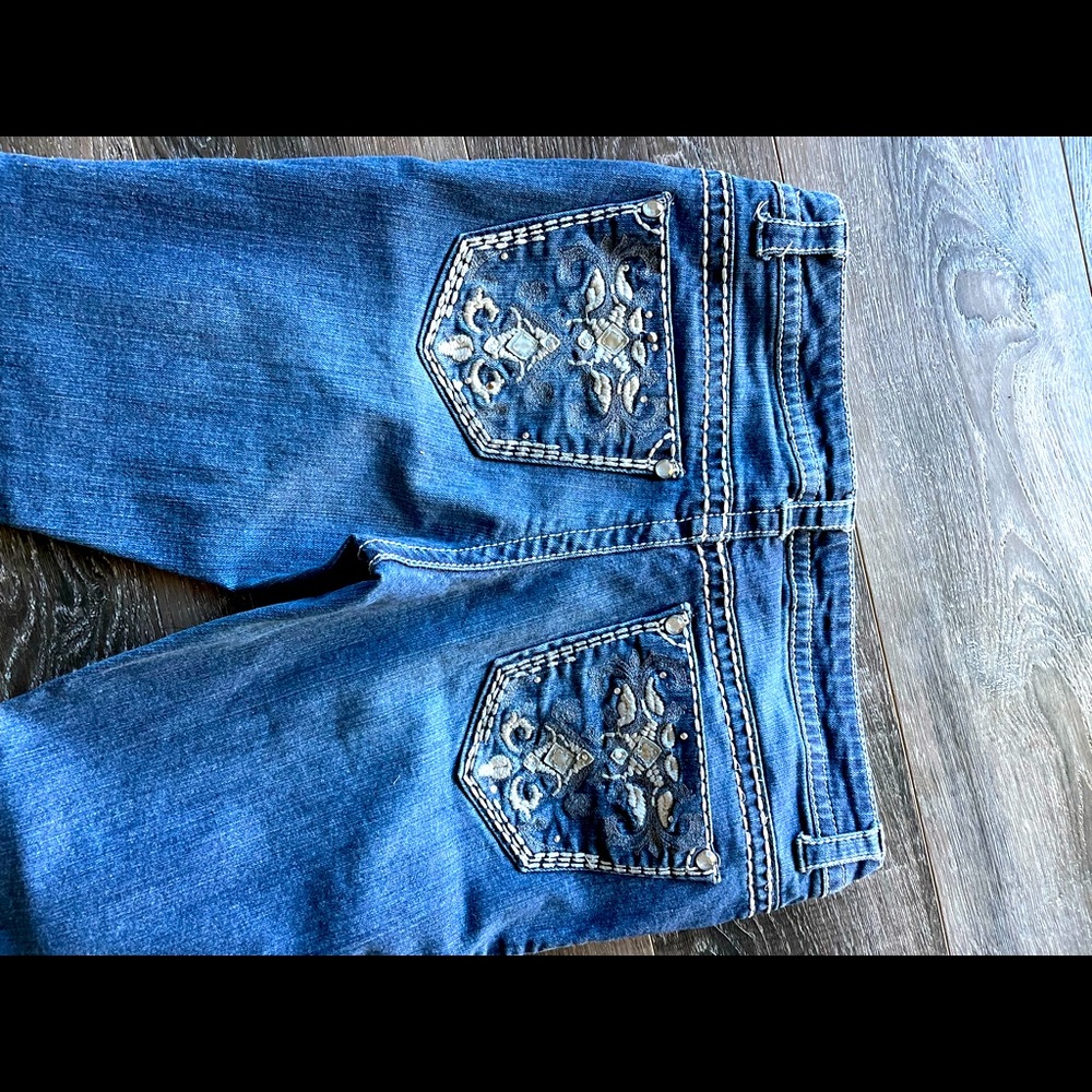 Boot Cut Jeans with flair pockets